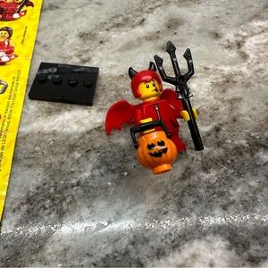 LEGO Red Devil Minifigure with Orange Pumpkin